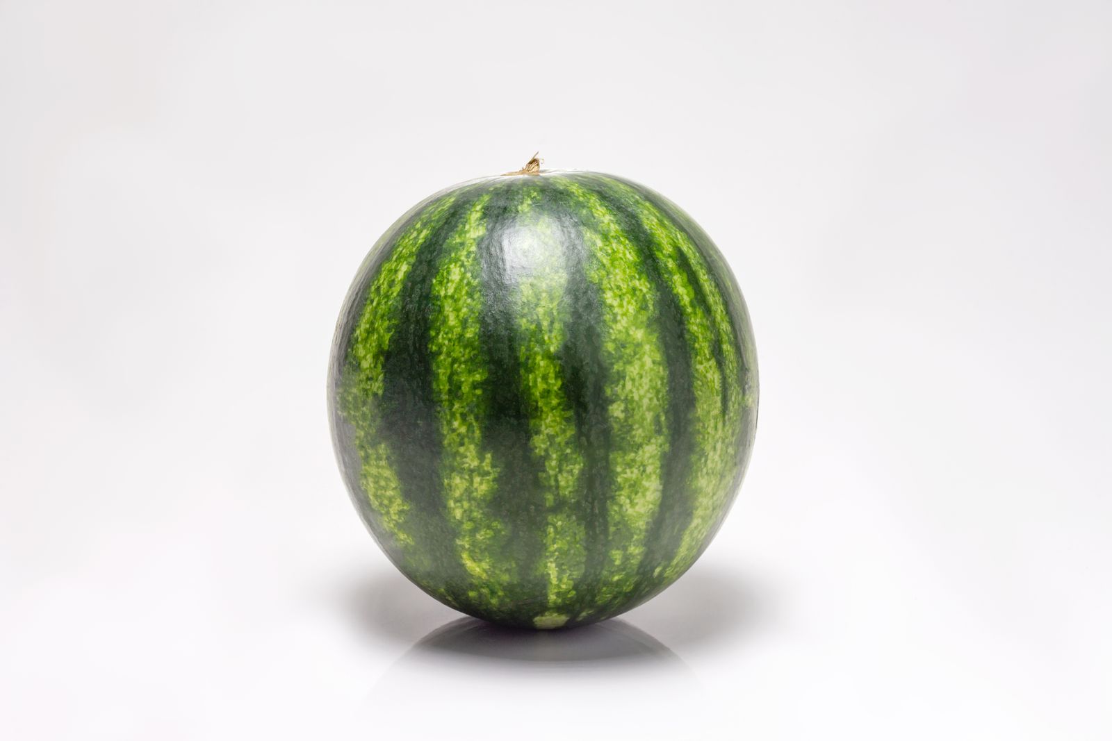 Whole watermelon on a white background